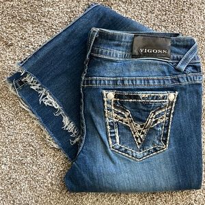 Vigoss dark denim boot cut jeans with designer stitched pockets. Size 9/10.